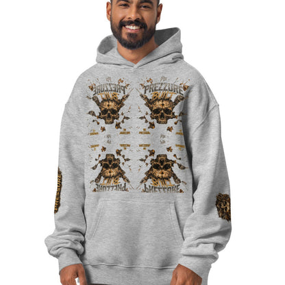 A man wearing a light gray pullover hoodie with a detailed graphic print featuring skulls, tribal patterns, and the text 'THE FREEDOM FEELERS' on the front and sleeves, set against a plain white background.